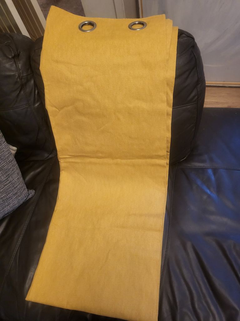 Mustard eyelet curtains