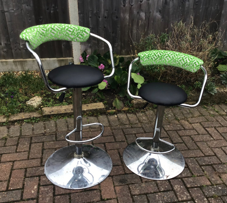 Matching pair of adjustable bar stools seller refurbished in Designers Guild fabric