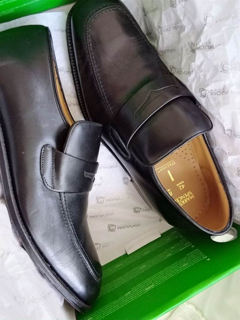 Brand new pair of Marks and Spencer men's black leather shoes.