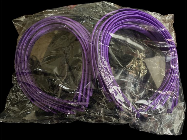 20 purple hair bands.  New. 