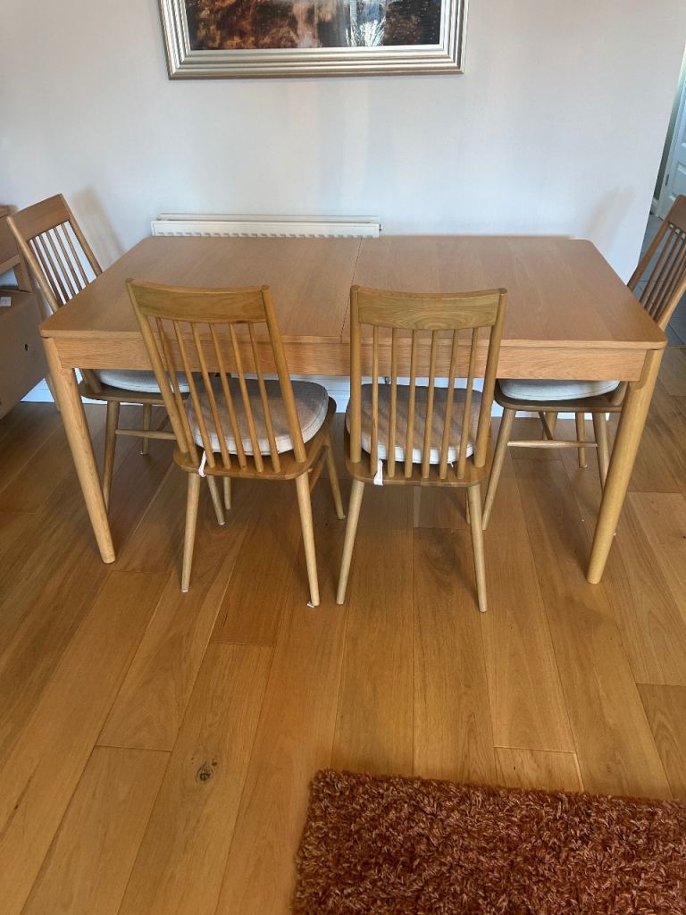 Ercol romana dining table and four chairs 