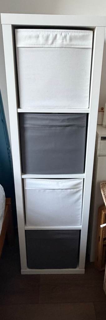 Ikea Kallax shelving unit with boxes