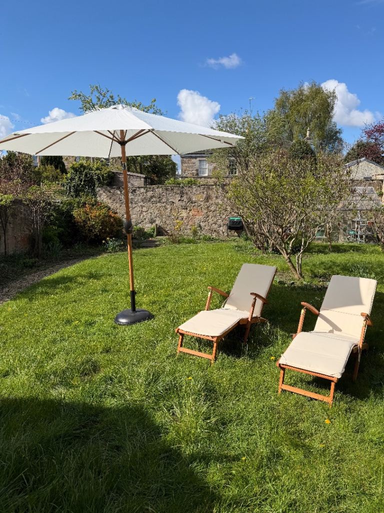 Garden set: large parasol with weighted base + two wooden sun loungers