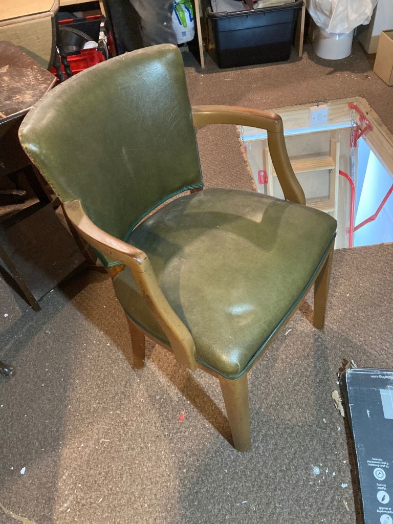 Leather upholstered chair with arm wrests ONLY 2 LEFT
