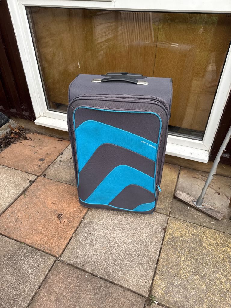 Good Condition Grey Suitcase with Blue Detail