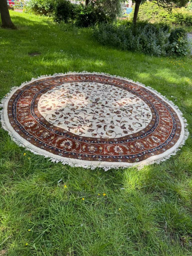 Handmade round woo rug.