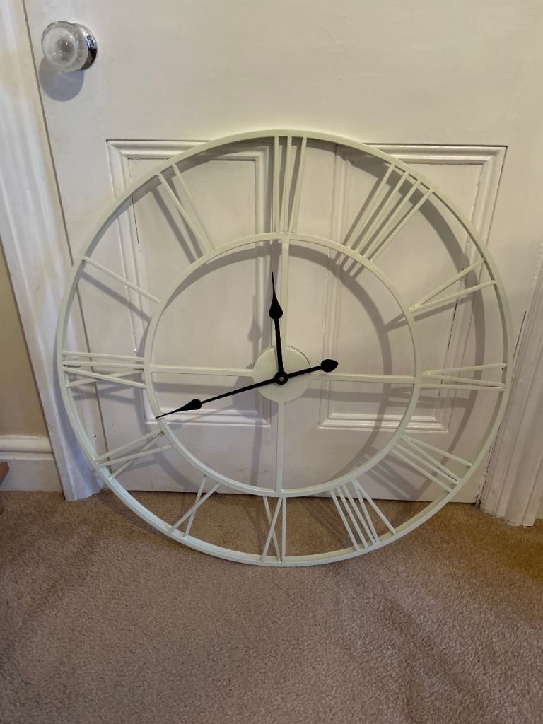 Cream skeleton clock. Laura Ashley. 