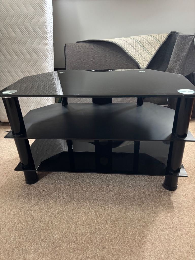 TV stand , glass topped 