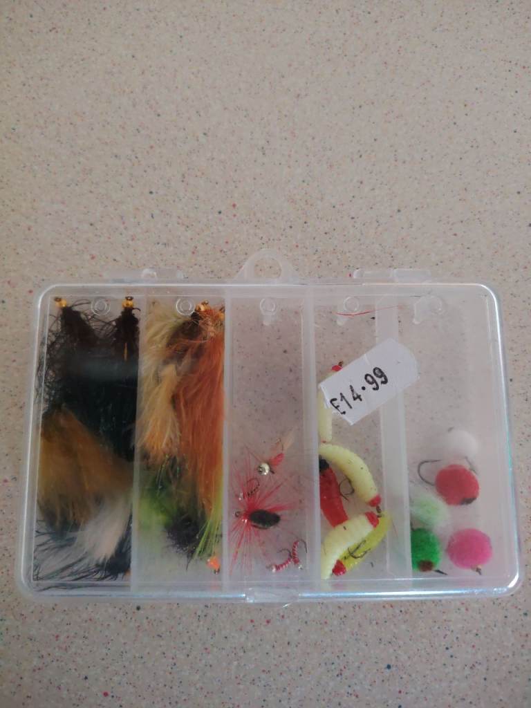 New Fishing Lures and Flies in Tackle Box