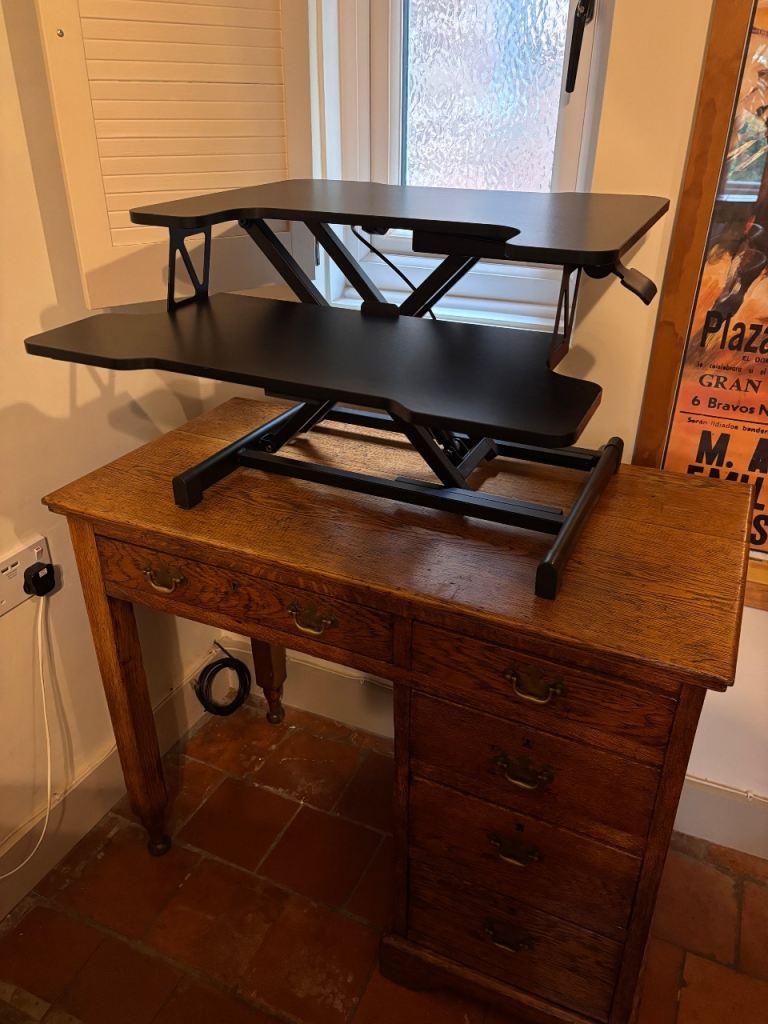 A BONTEC sit-stand desk converter in good condition