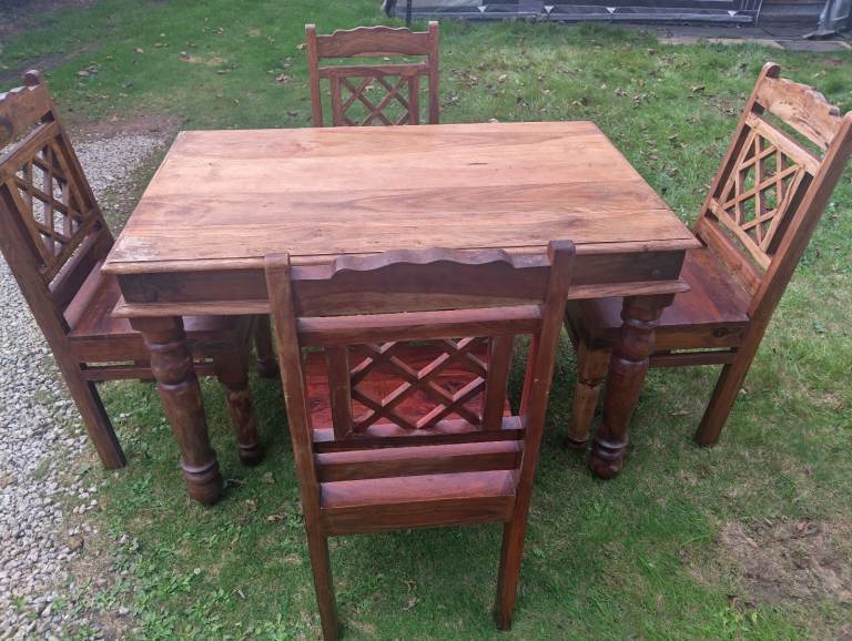 Heavy solid wood dining table and chairs