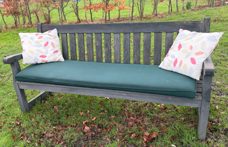 Grey Darwin 4 seater bench with cushions