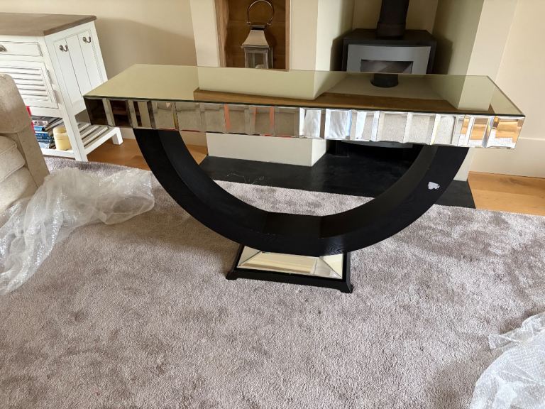 Mirrored Console Table with Black Curved Base – Good Condition