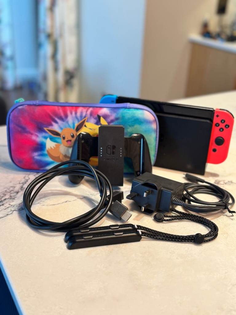 Nintendo Switch OLED 64GB Neon Red & Blue Bundle