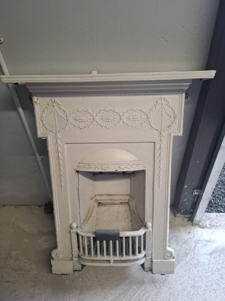Genuine Cast Iron Fireplace with Ornate Detail