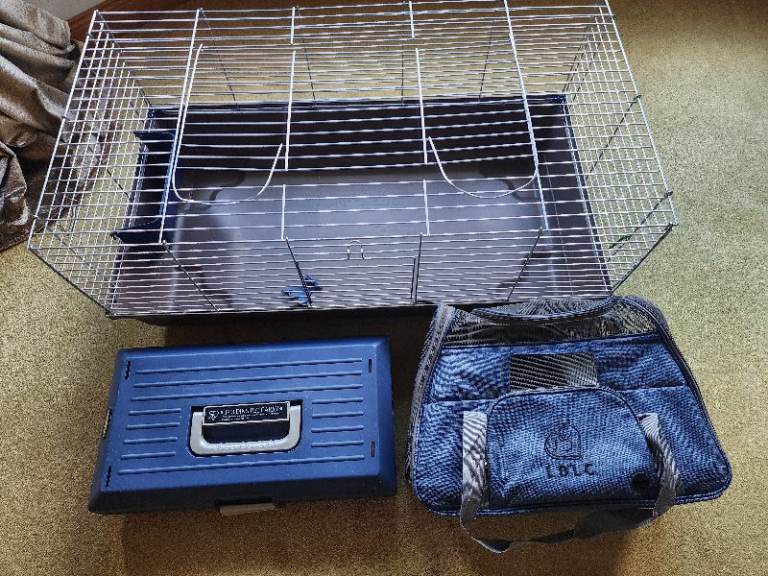 Pet carriers and cage.