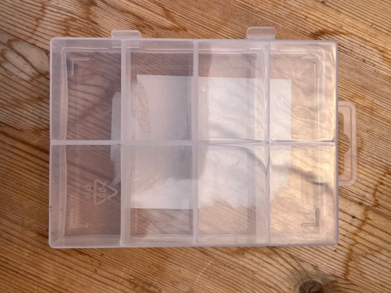 Storage little box with 8 compartments & clip close fastening. New. £2.