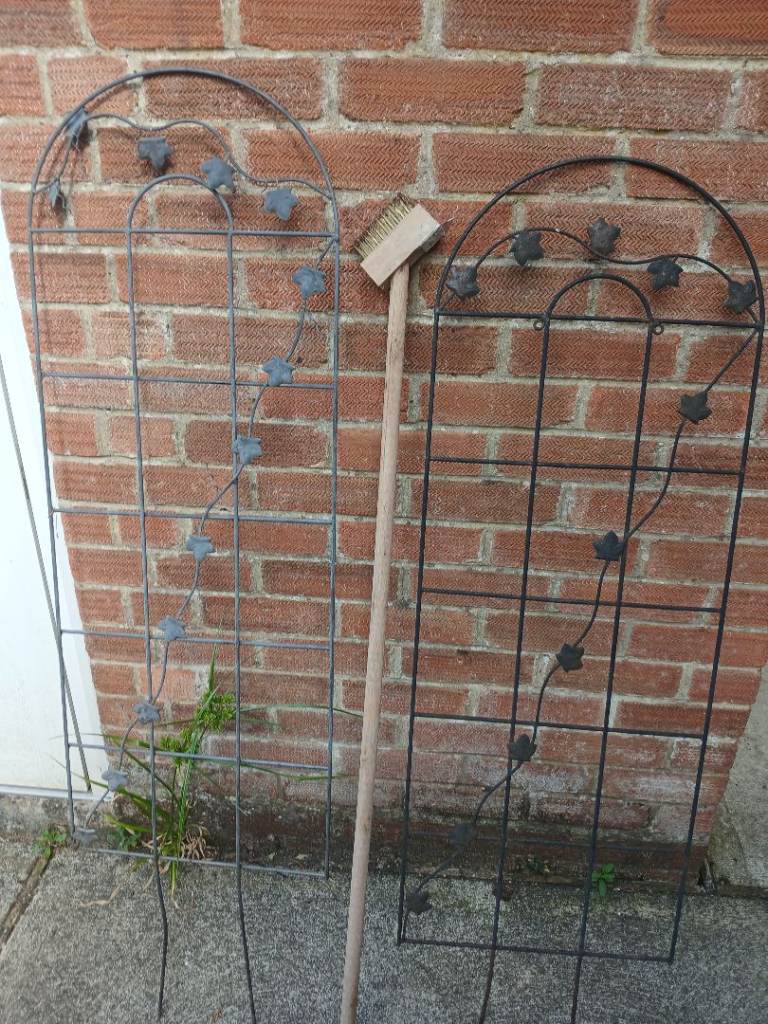 Two Metal garden climbers 