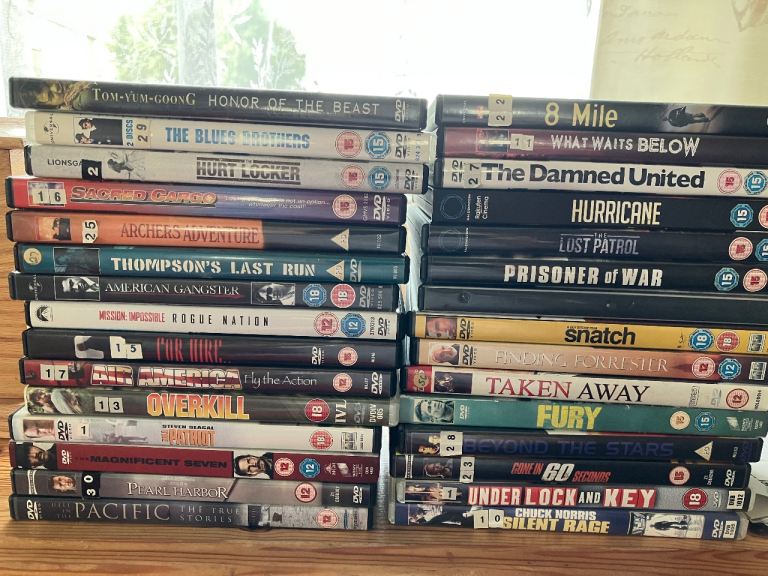 Large Bundle of DVDs - Action, Drama, and More