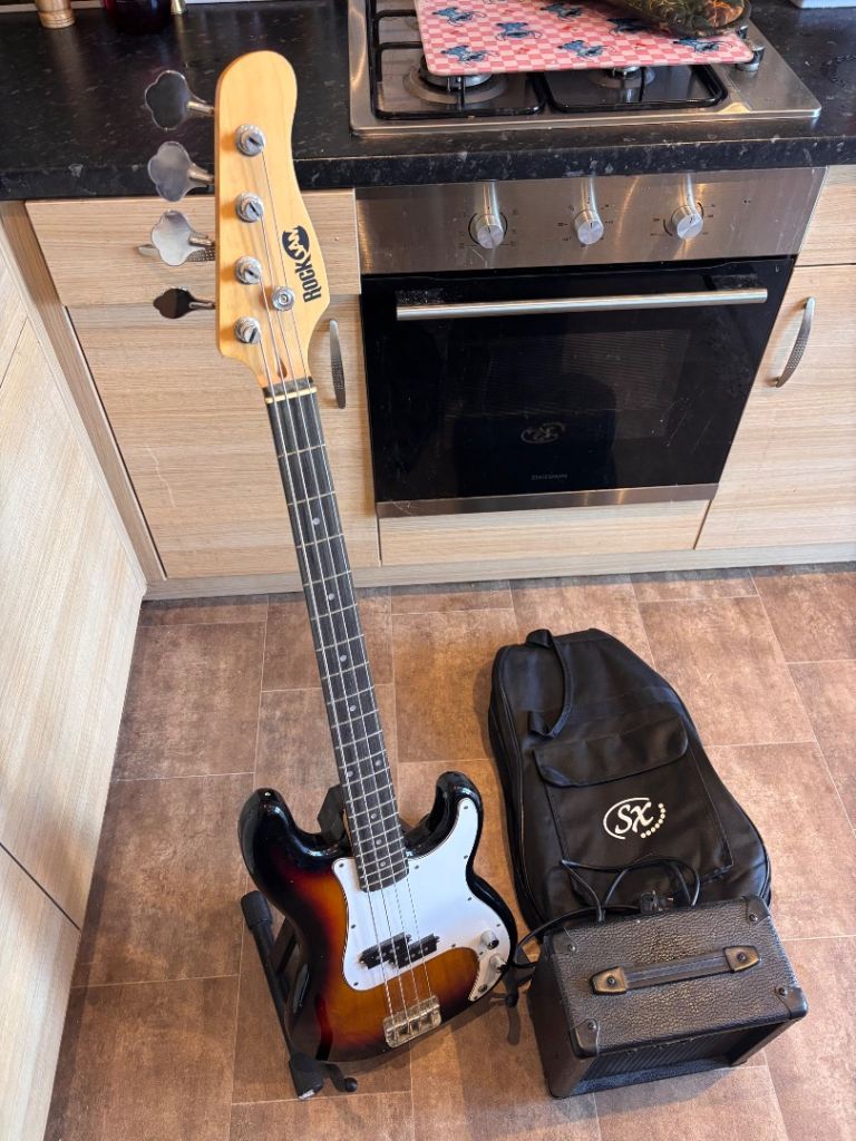 Rock Jam Bass , Axl Power10 Amp with stand and bag