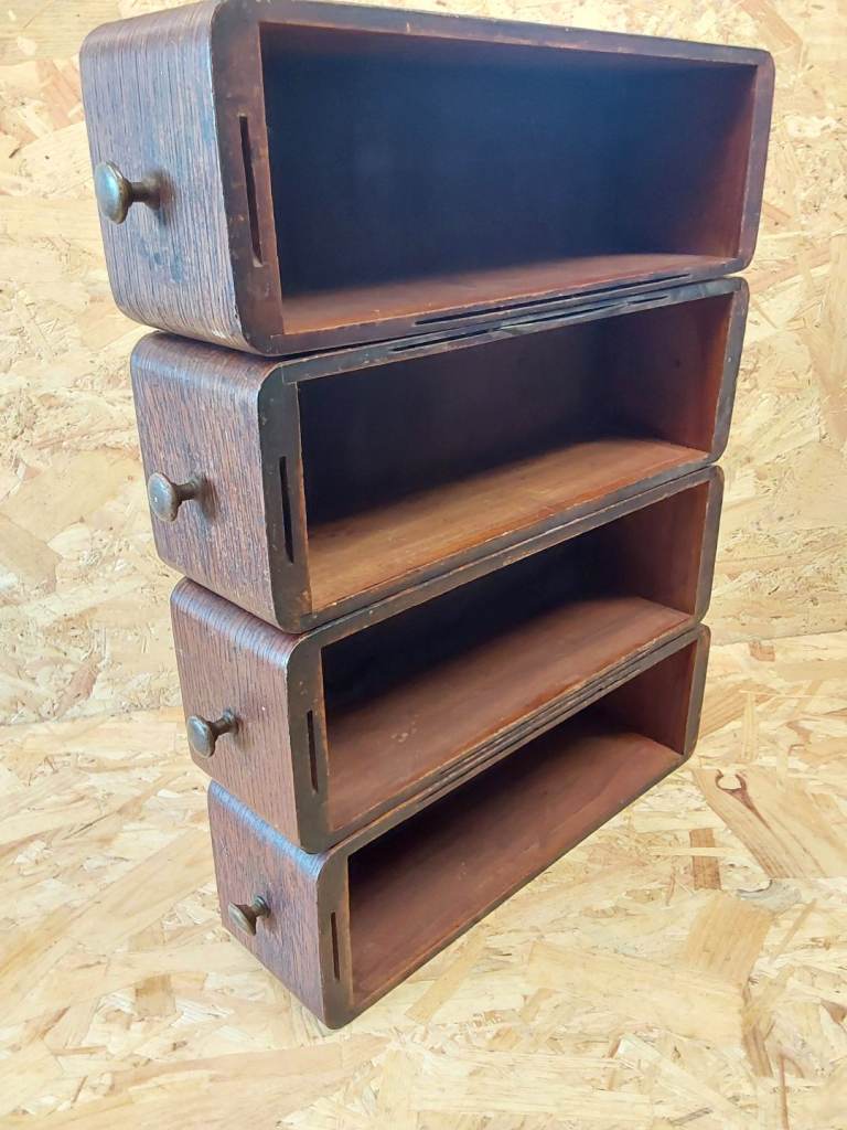 Set of 4 vintage Singer sewing machine drawers in their original hanging cages 