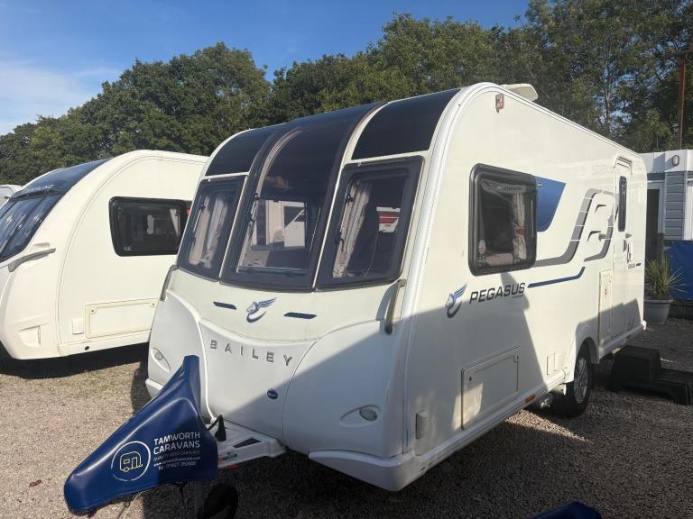 BAILEY PEGASUS GENOA - 2 BERTH CARAVAN WITH END WASHROOM + MOTORMOVER