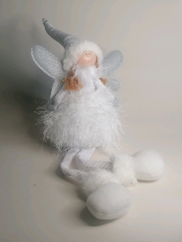 8 - inch sitting angel, brand new. 