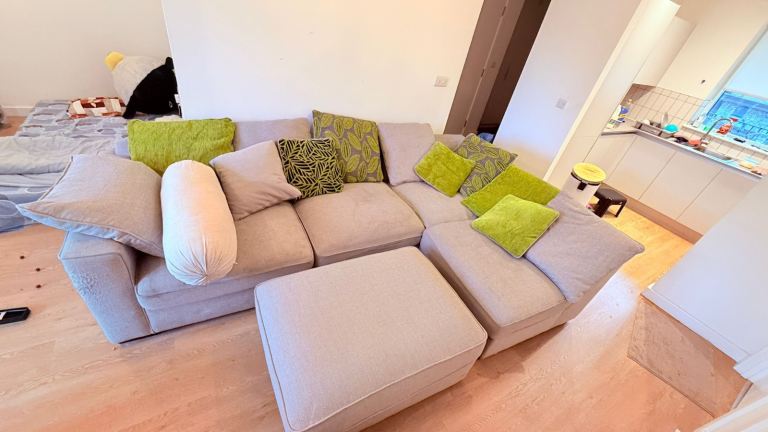 Large Beige Fabric Corner Sofa with Matching Footstool/Ottoman – Excellent Condition