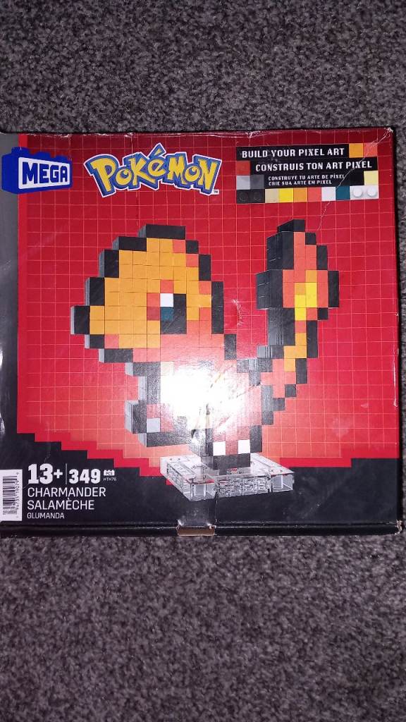 Mega Pokémon Charmander pixel art build set featuring 349 pieces for ages 13+ in original box