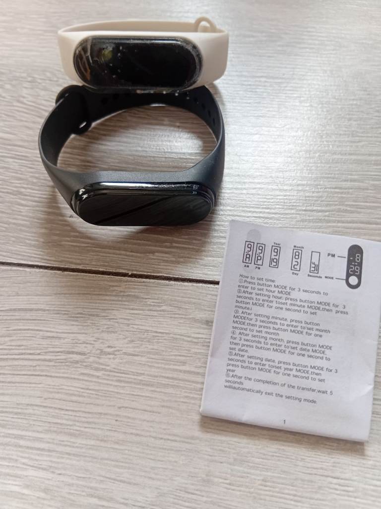 Smart Watch Fitness Tracker - Black and White Bands