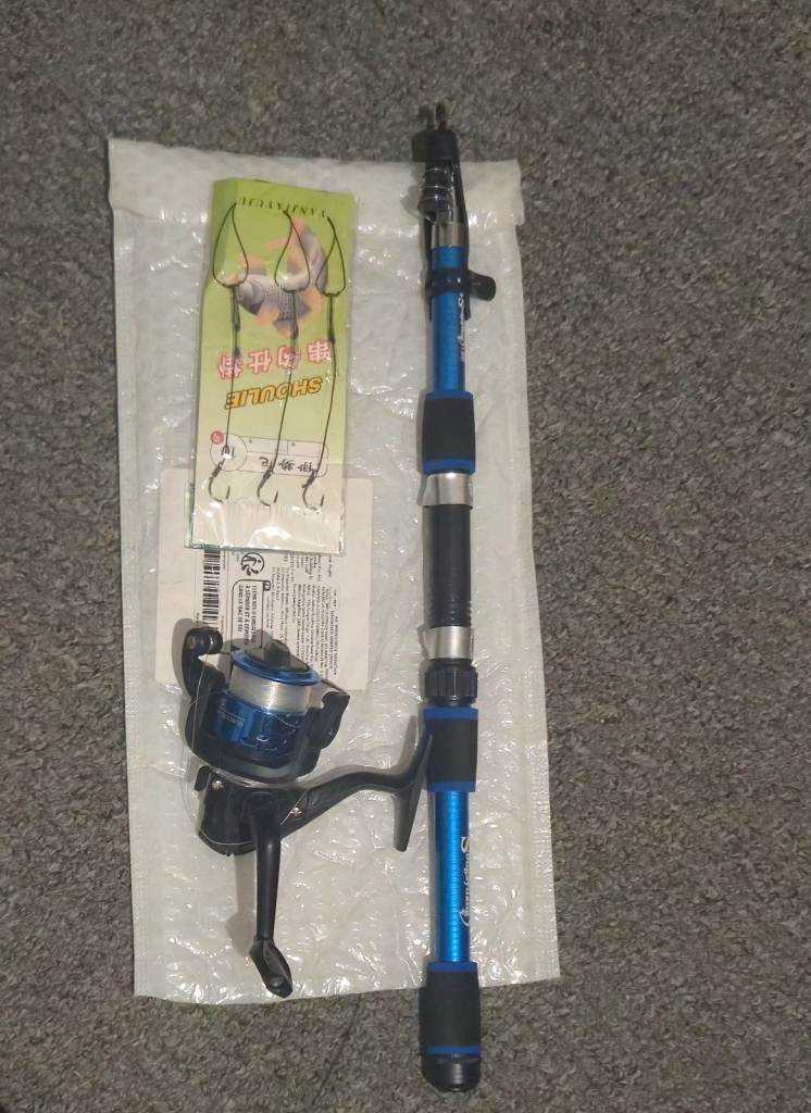 Compact Blue Fishing Rod and Reel Set with Hooks