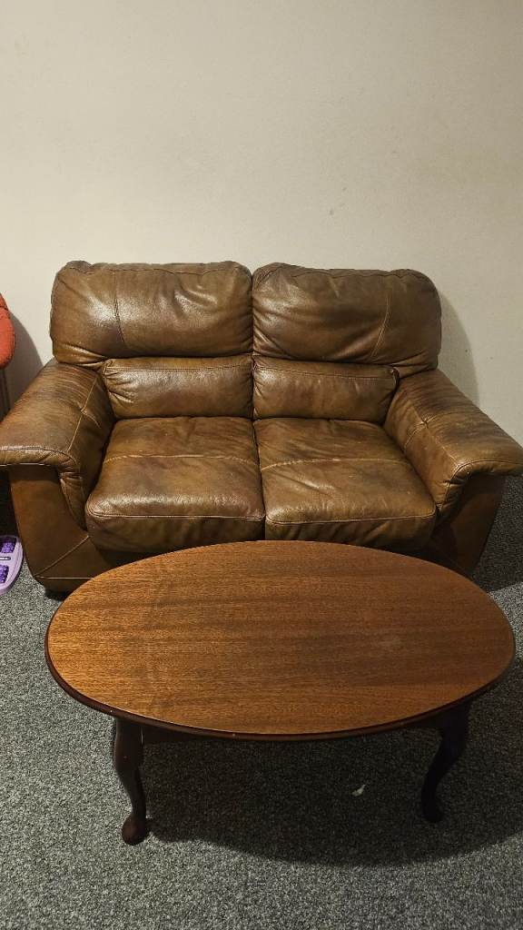 Leather sofa with coffee table