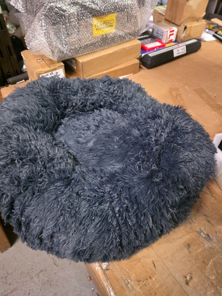 A new still packed 50cms x 50cms pet bed .