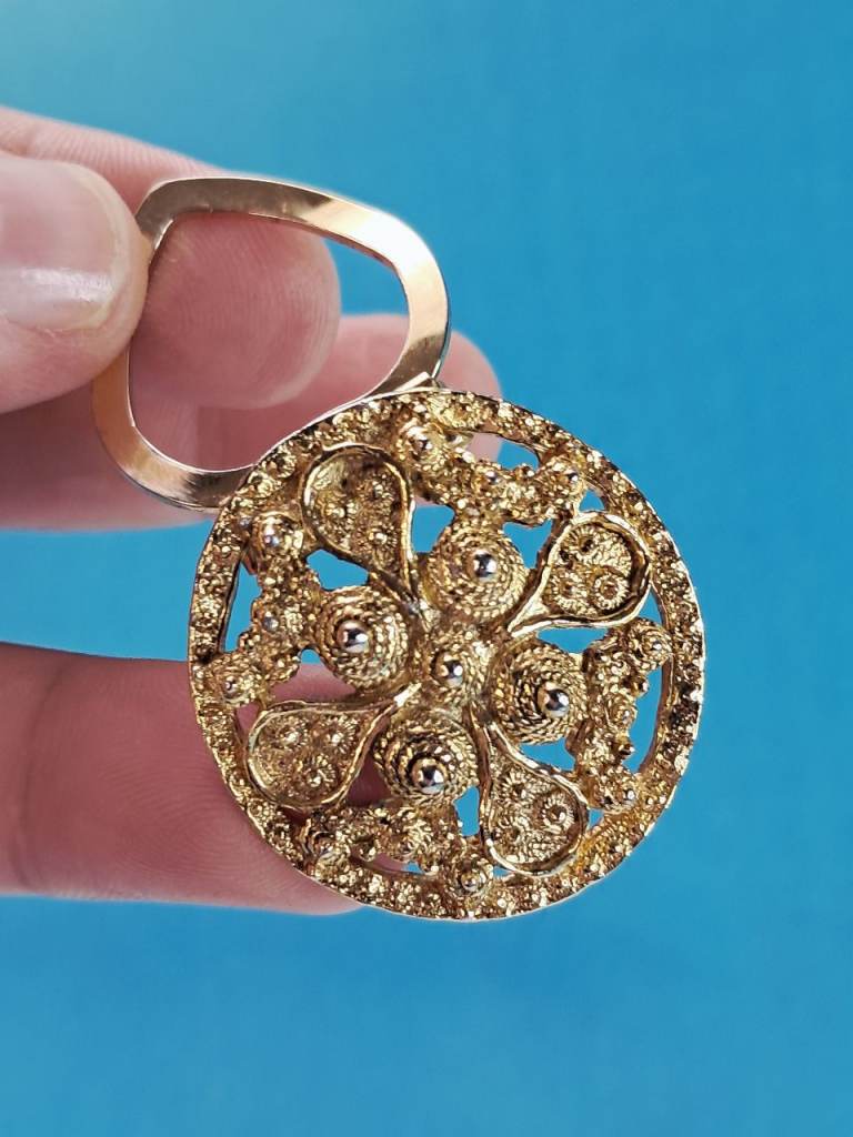vintage gold-tone filigree scarf clip.