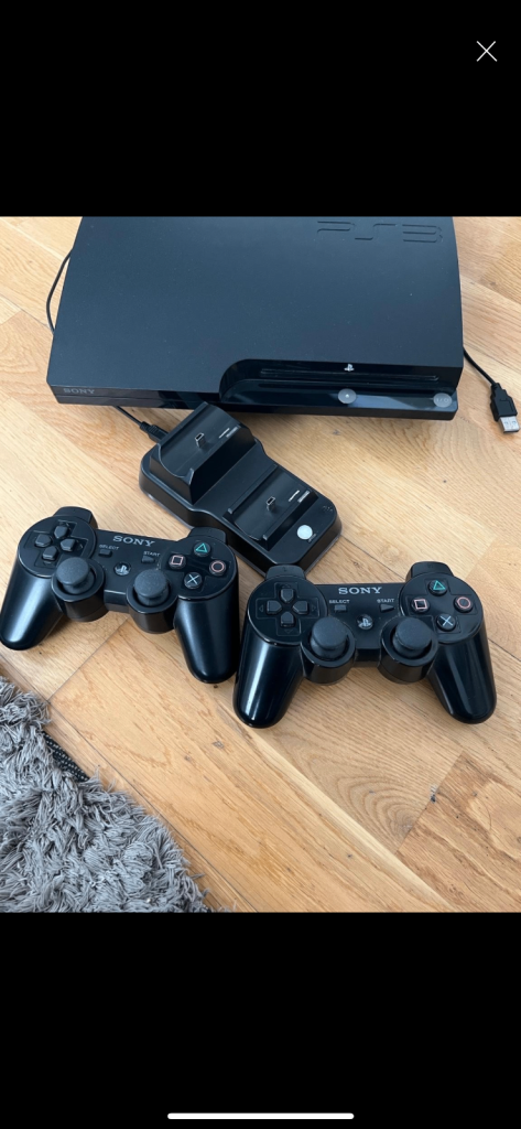 image for PS3 plus 2 controllers and docking charger