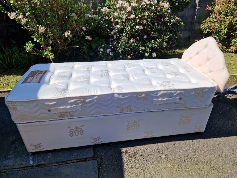 Single divan bed with mattress and headboard