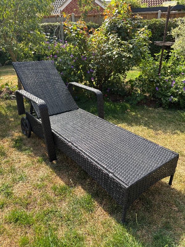 Black Rattan Sun Lounger – Wheels, Very good Condition