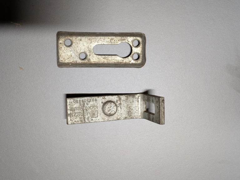 Garage door lock bracket 