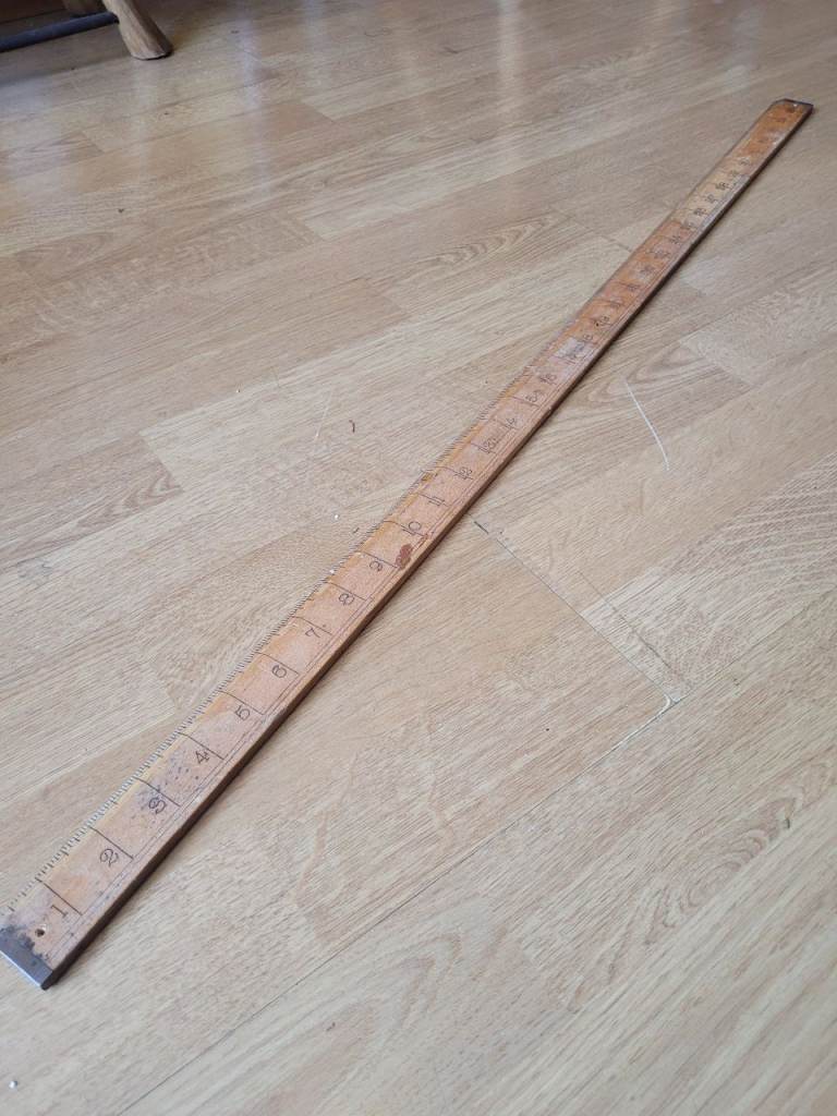 Vintage antique wooden yard stick, ruler.