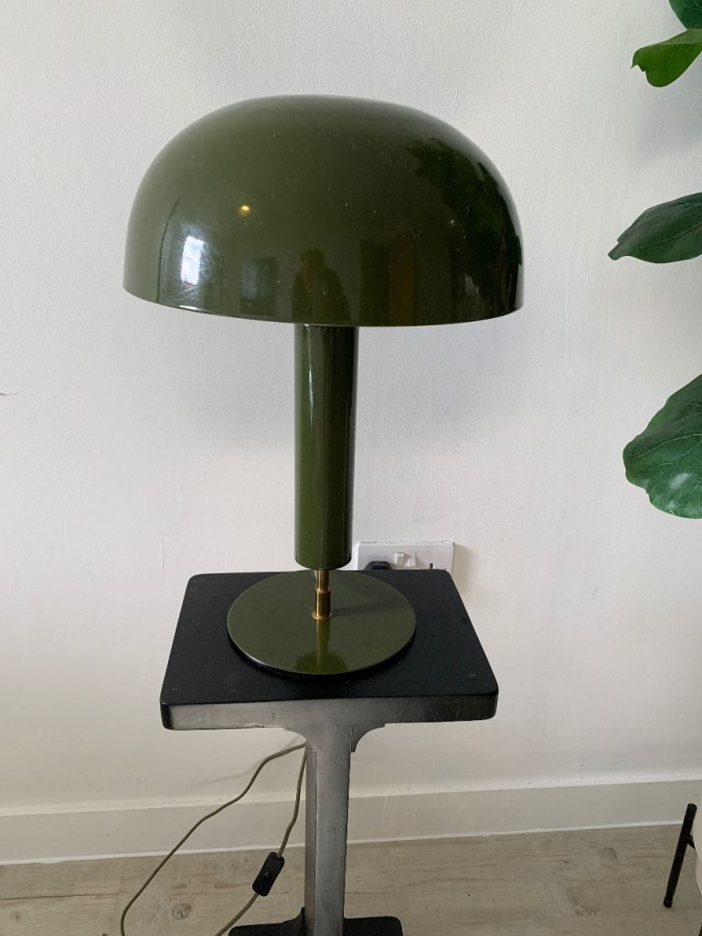 Green and gold circle lamp