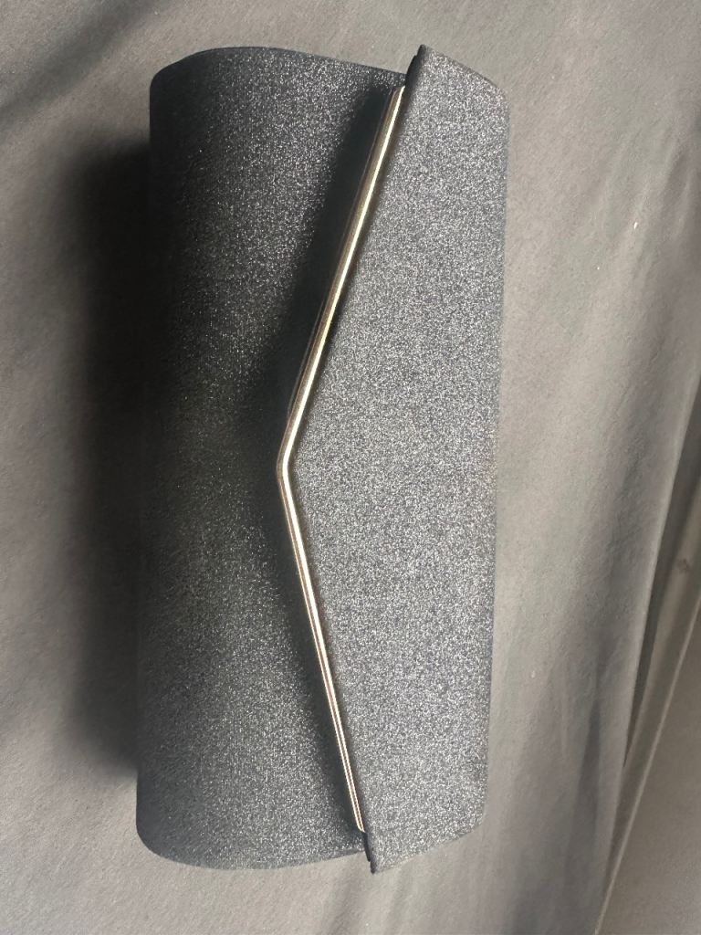 Stylish Black Clutch Bag with Silver Trim – Good Condition