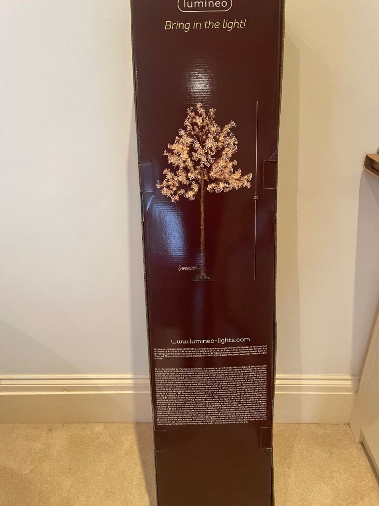 Cox and Cox 180m high faux Christmas tree with lights