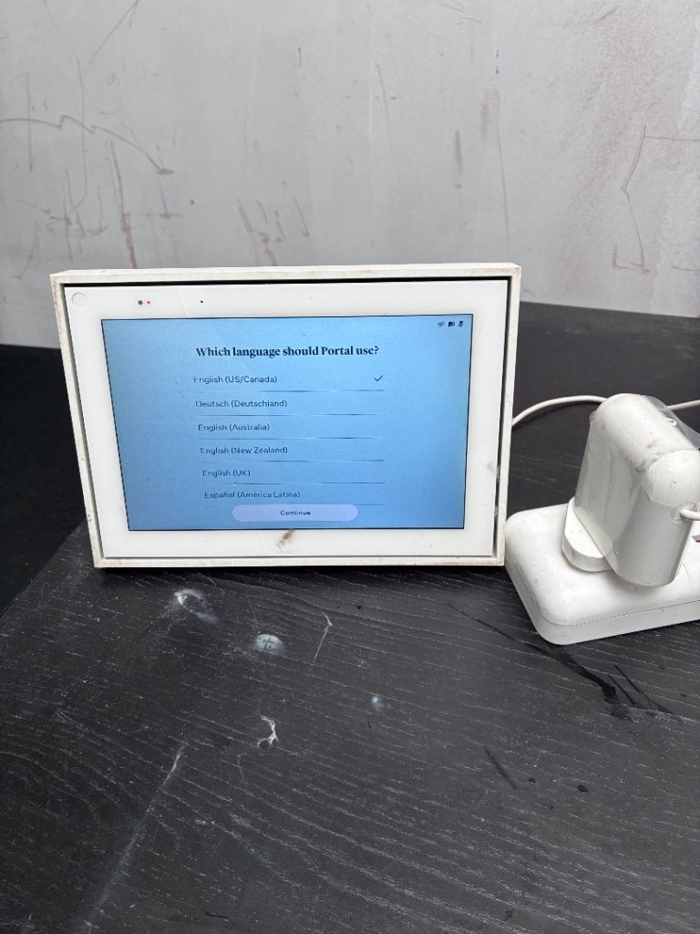White Tablet with Charger – Good Condition