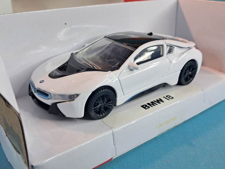 This is a Rastar 1:43 scale die-cast model car of a 2015 white BMW i8. Brand new.  As seen. 