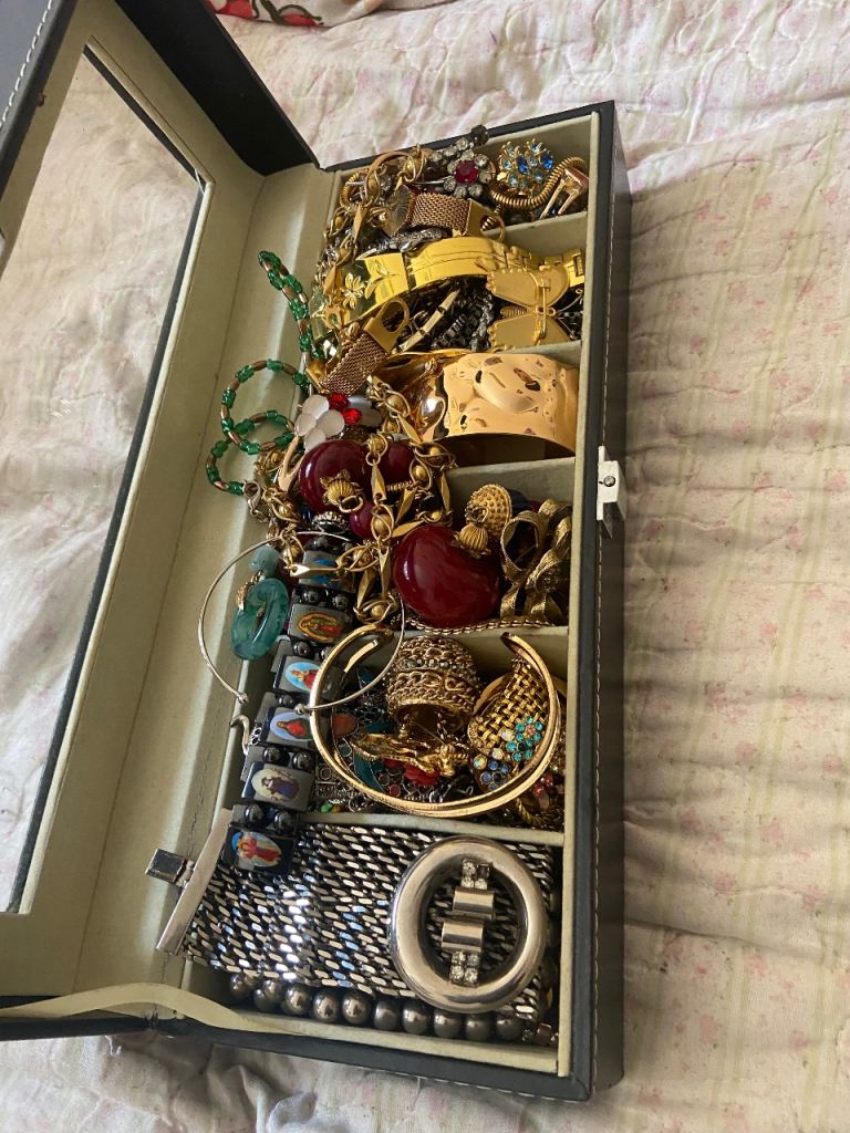 Old Nanny Jewellery box. . Most items unmarked and not tested. Silver and gold colour items. 