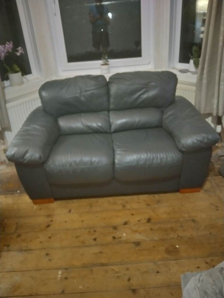 Dark blue leather sofa.Clean cond...non smoking house