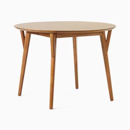 West Elm Mid-Century Modern Round Extendable Dining Table + four chairs