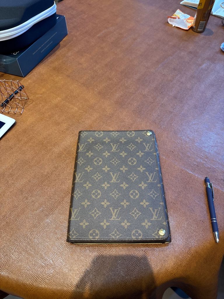 Original iPad and LV cover. 