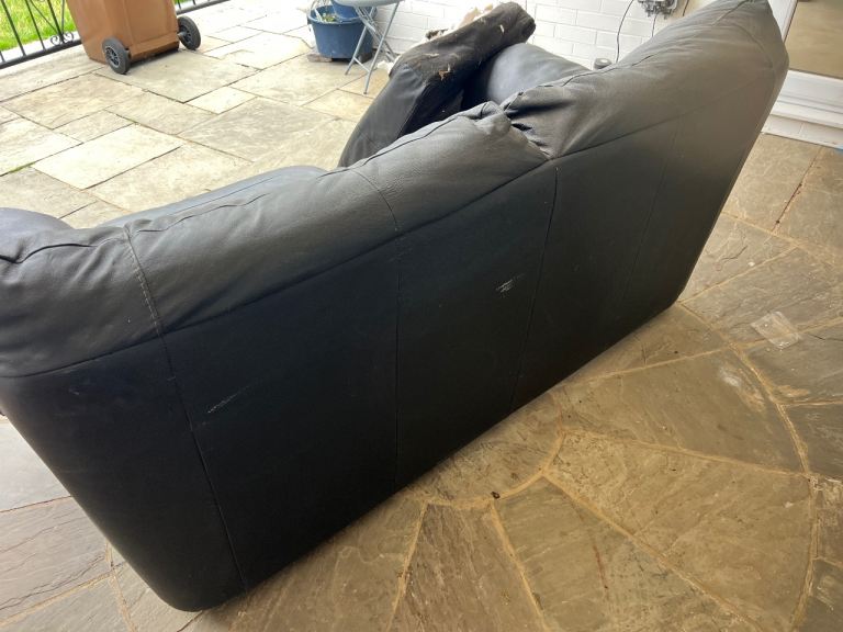Black Leather 2-Seater Sofa Bed - Fair Condition