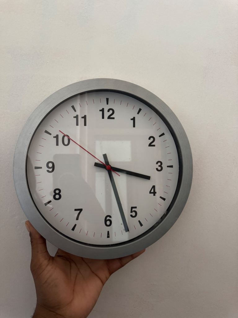 Grey/silver battery wall clock